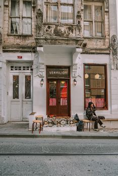 A cozy outdoor cafe with rustic architecture, ideal for a relaxed street view in a European city.