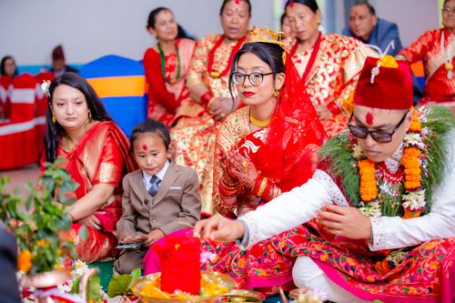 Free Colorful Nepalese wedding capturing cultural traditions and vibrant attire. Stock Photo