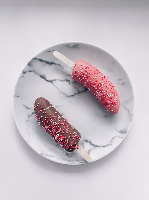 Ice creams placed on marble table