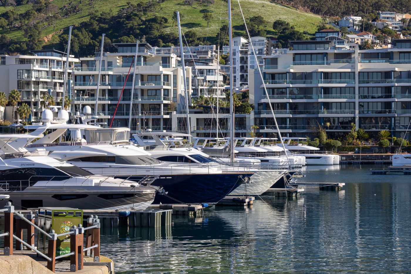 Marina with yachts and waterfront apartments