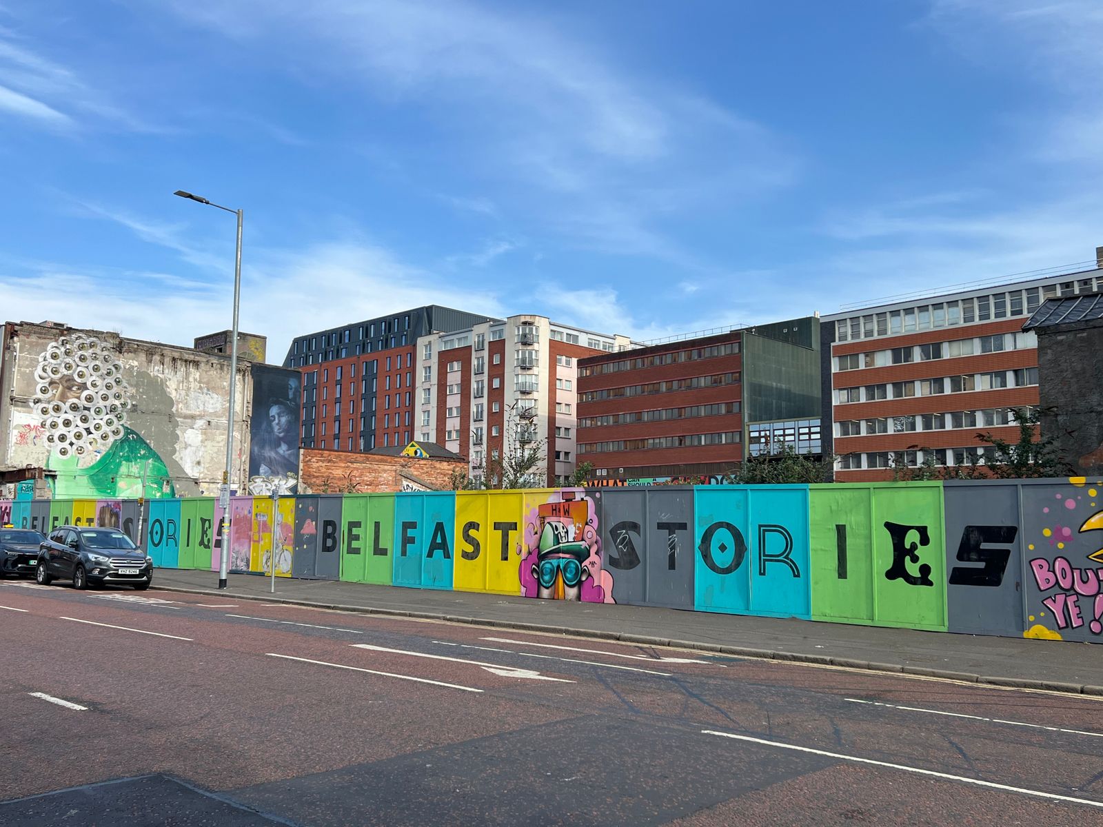 Street art on a sunny day in Belfast, showcasing urban creativity