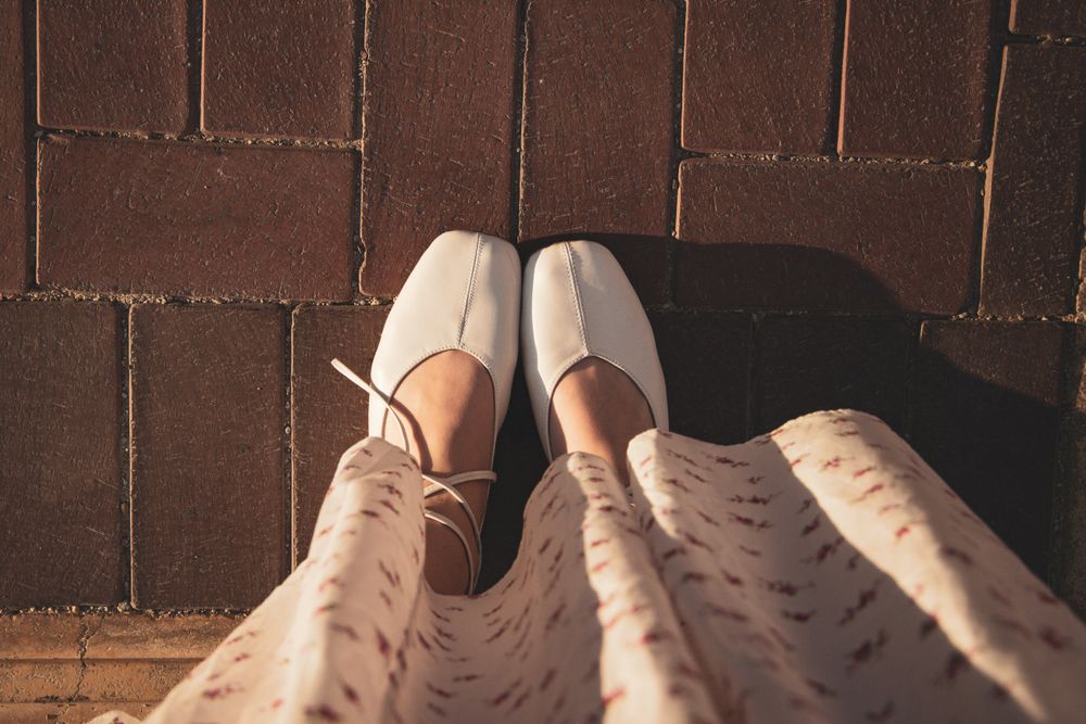 Ballet flats and cropped trousers — modern shoe pairing