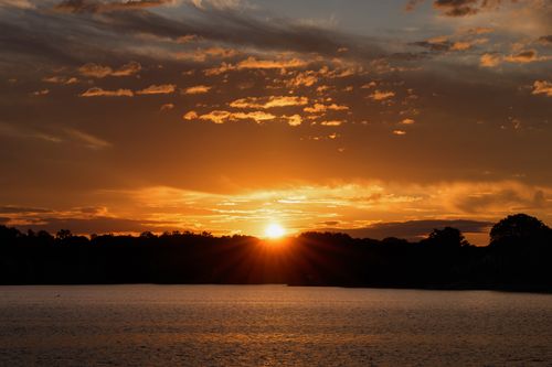 Free Tranquil sunrise at Cove Island Park in Stamford, Connecticut, capturing vivid autumn skies. Stock Photo