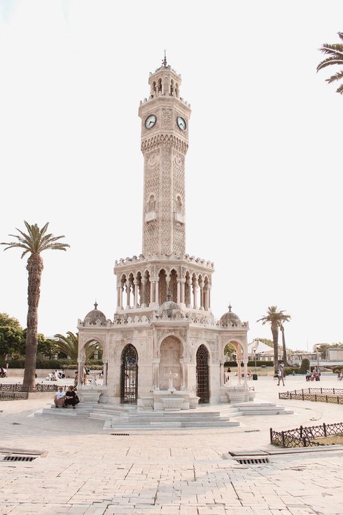 Free Elegant Clock Tower at Konak Square in İzmir, Turkey, against a bright sky. Stock Photo