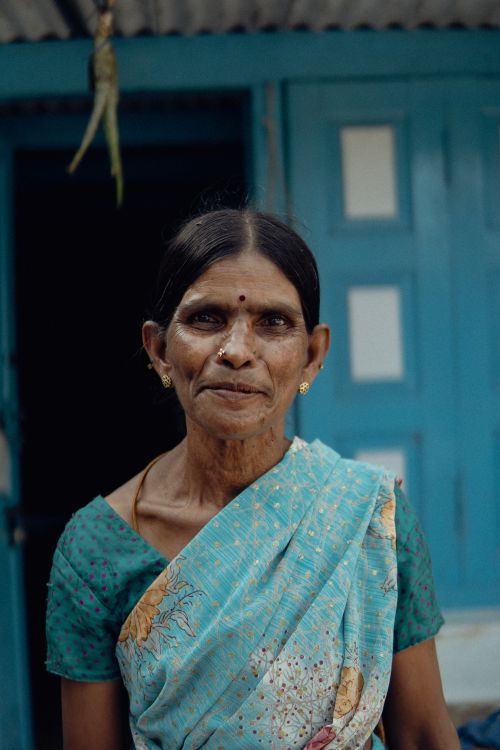 Free Authentic portrait of an Indian woman in a traditional blue saree, captured in rural Coonoor, Tamil Nadu. Stock Photo