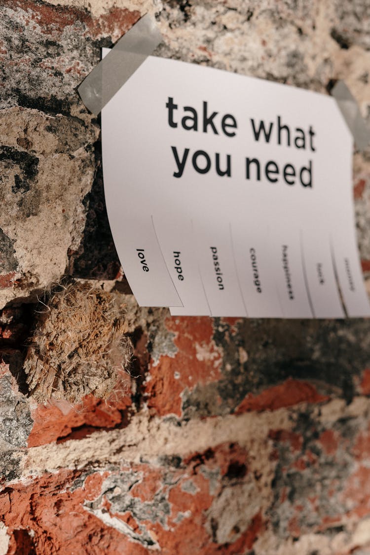 A Paper Taped On A Wall