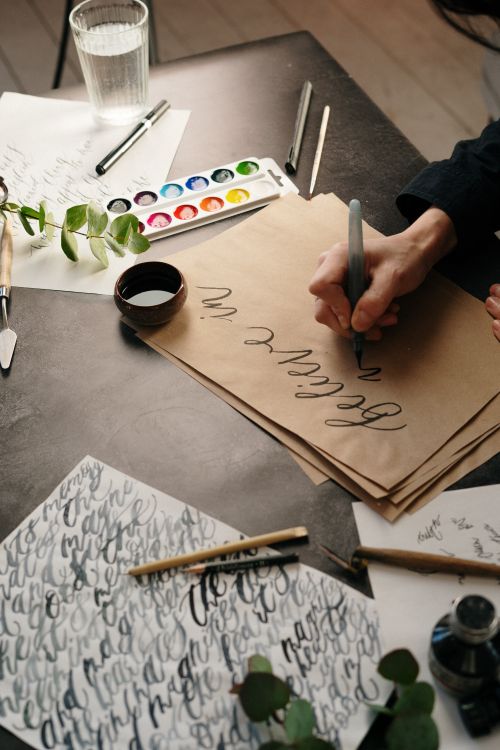Person Doing Calligraphy · Free Stock Photo