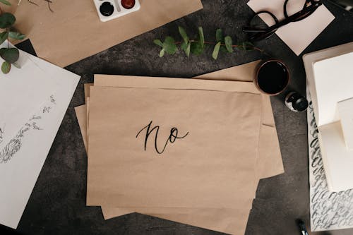 Free Brown Paper With Handwritten Text Stock Photo