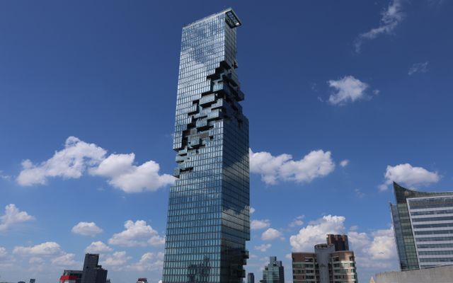 Photo: Jess Chen on Pexels Stunning view of the MahaNakhon skyscraper in Bangkok against a clear blue sky.