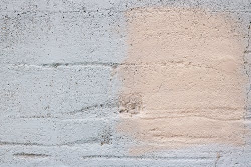 Pinky Paint on White Concrete Wall