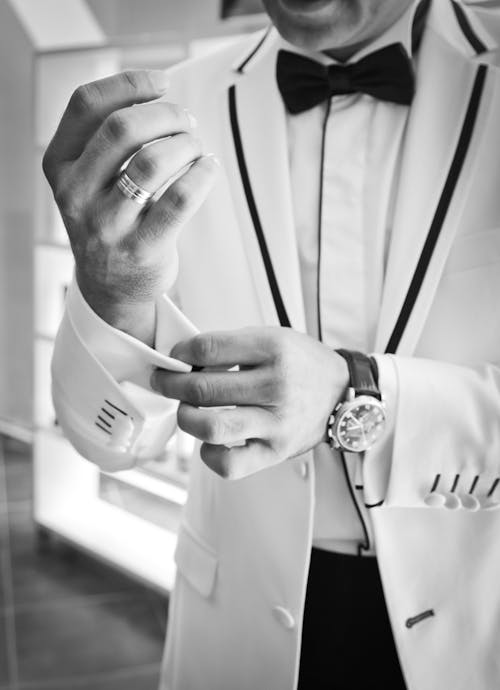 Free Man Wearing Tuxedo in Grayscale Photography Stock Photo