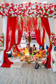 Vibrant Hindu wedding ceremony with traditional rituals and decorations.