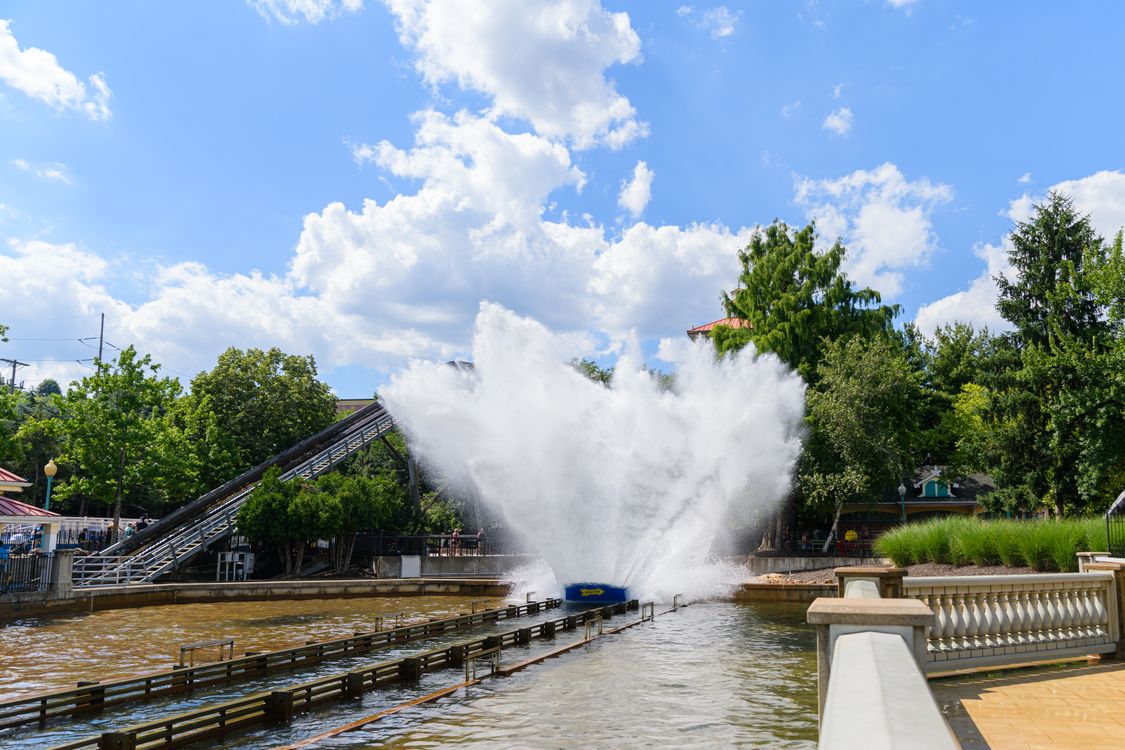 Water Ride Splashing Exciting Water Ride Splash at Amusement Park · Free Stock Photo