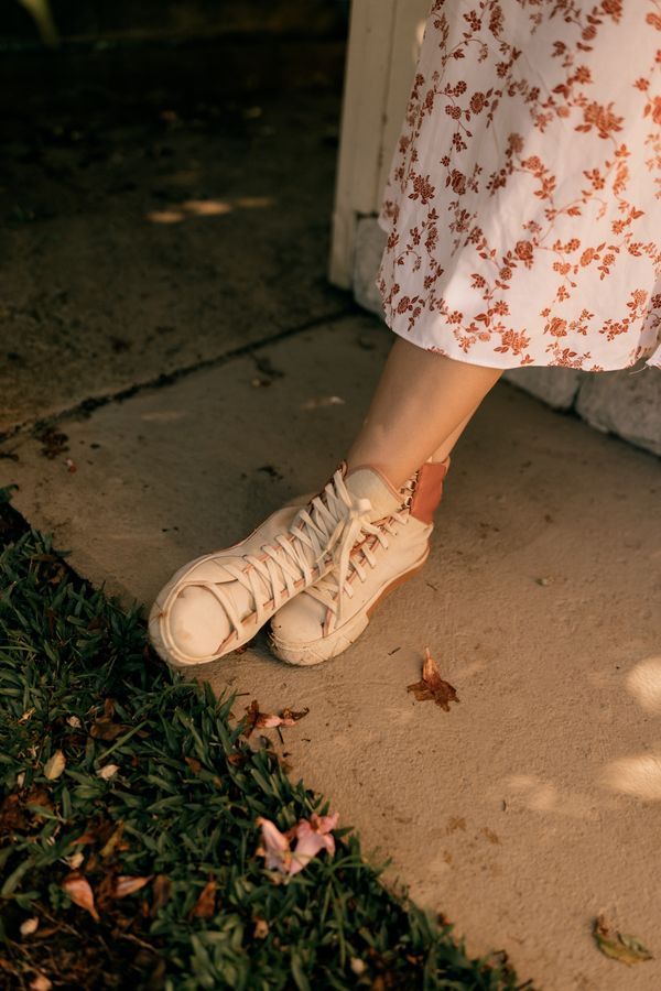 Floral dress, high-top sneakers
