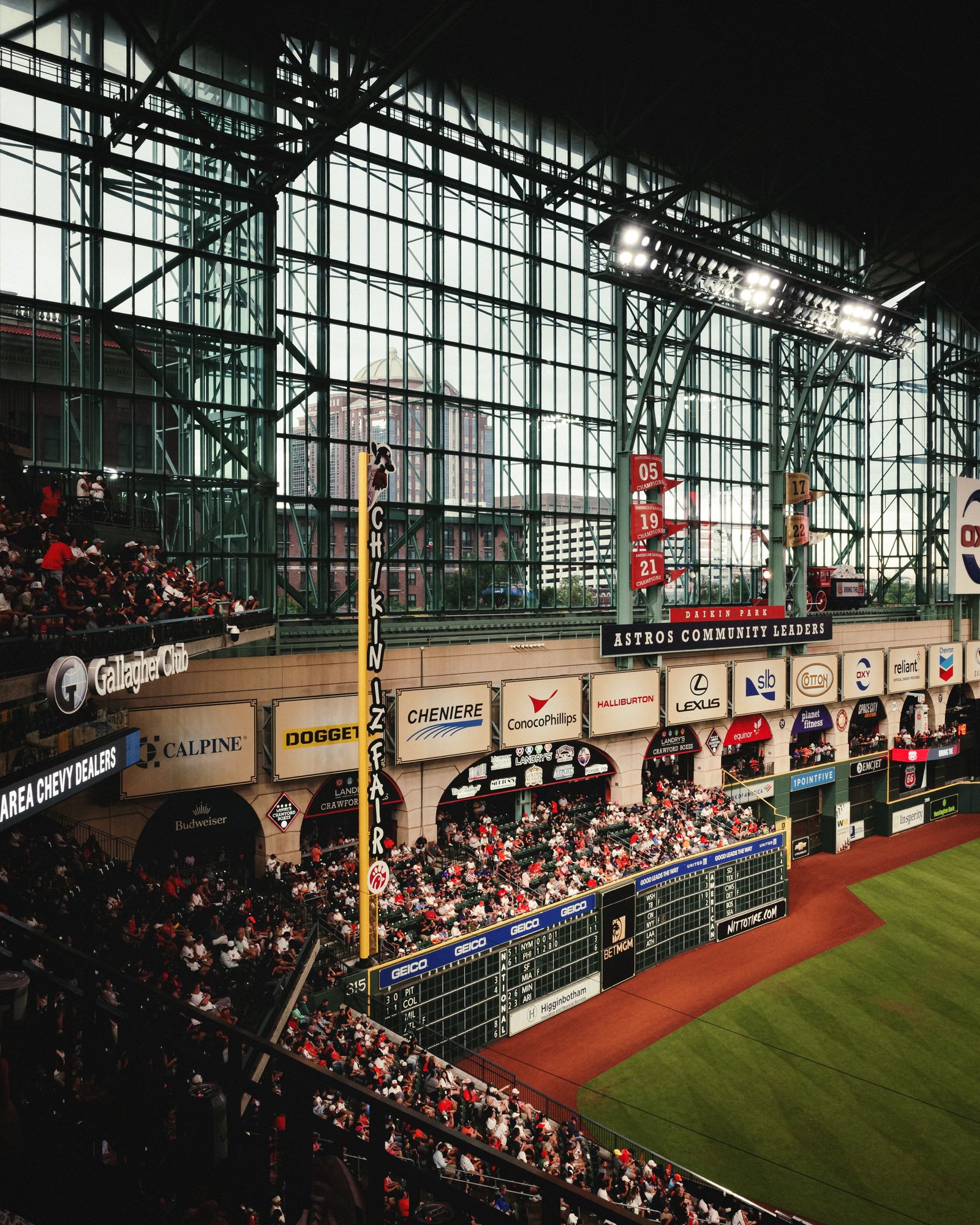 A packed major-league ballpark seen from the seating bowl during a game