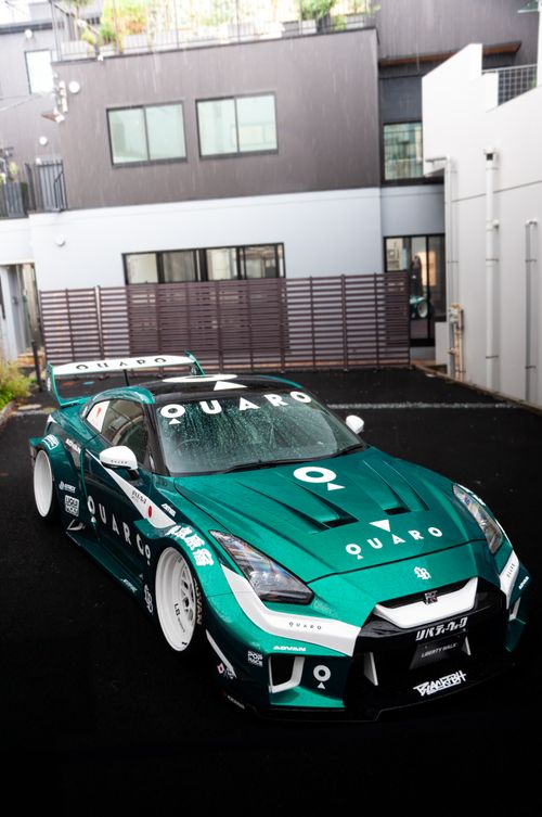 Free High-performance sports car parked outdoors in Tokyo, showcasing sleek design and modern automotive art. Stock Photo
