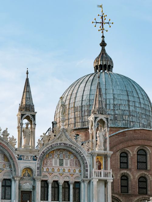 Free The iconic dome and facade details of St. Mark's Basilica in Venice showcasing stunning architecture. Stock Photo