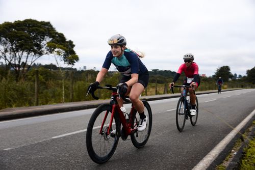 Free Cyclists riding on a road in Quatro Barras, Paraná, showcasing outdoor fitness and active lifestyle. Stock Photo