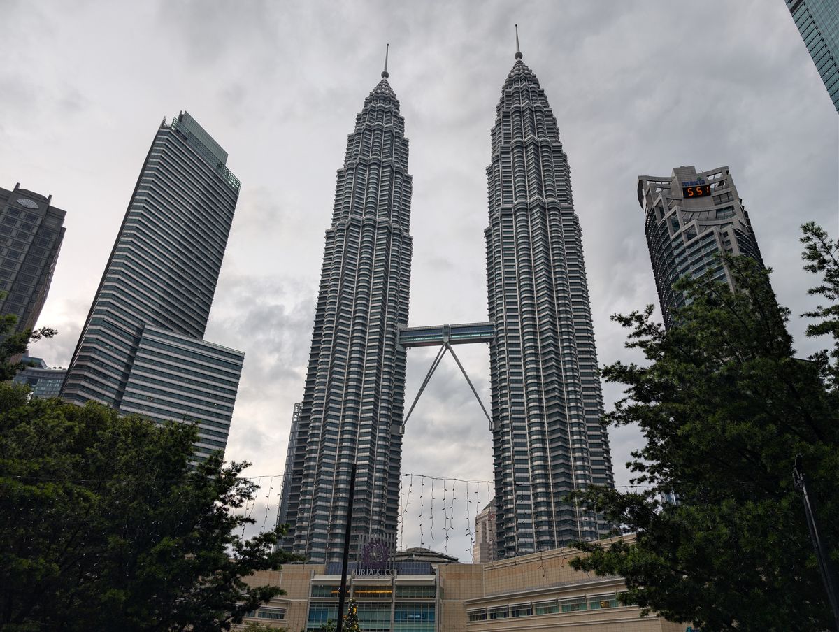 The Petronas Twin Towers rising above Kuala Lumpur's skyline.
