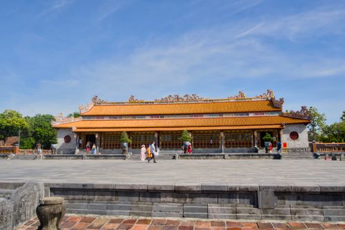 Free Front view of the historic Imperial Citadel in Hue, Vietnam, under a clear blue sky. Stock Photo