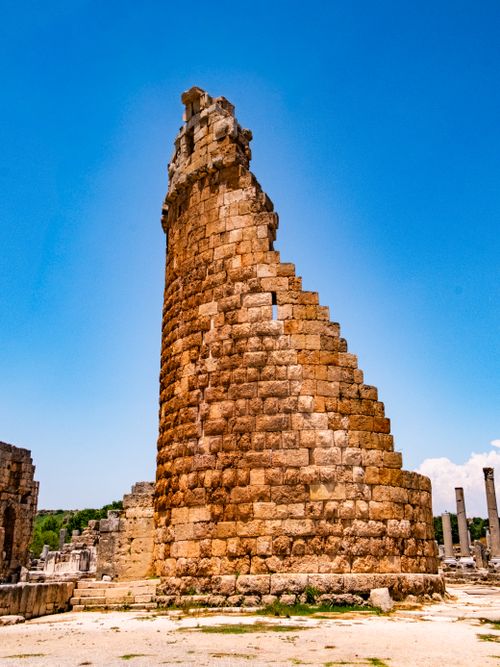 Free Explore ancient stone tower ruins under a bright blue sky, showcasing timeless architecture and history. Stock Photo