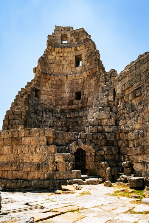Free Explore the captivating ancient stone ruins under a clear blue sky. Stock Photo