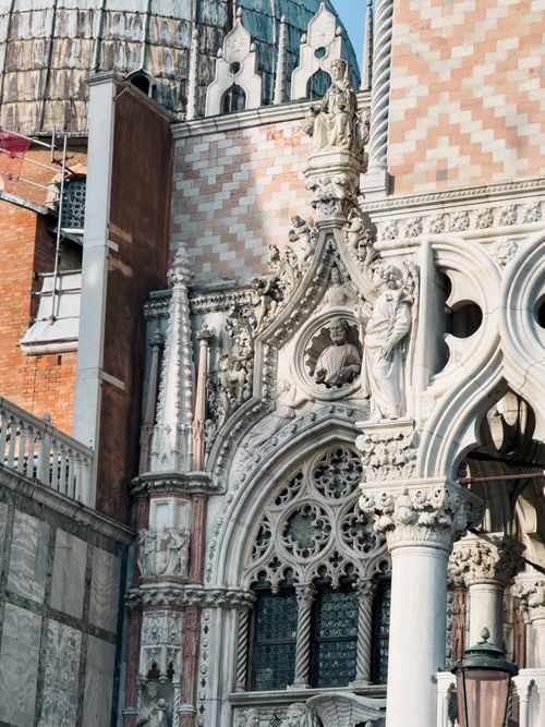 Free Detailed view of the ornate Gothic architecture of St. Mark's Basilica in Venice, showcasing decorative sculptures. Stock Photo