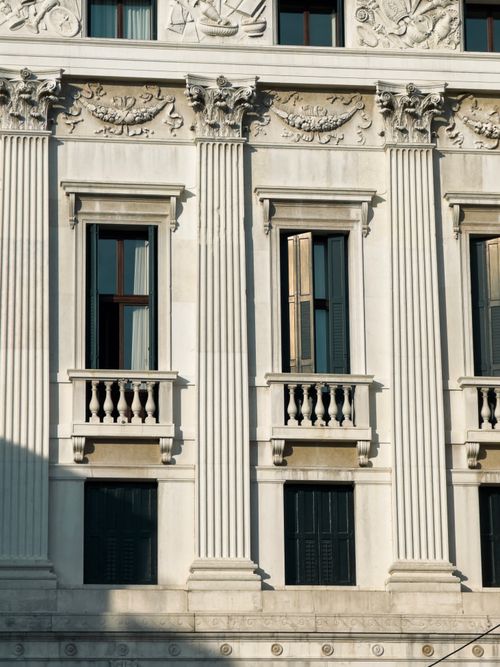 Free Detailed view of ornate Venetian facade featuring classical columns and intricate carvings. Stock Photo
