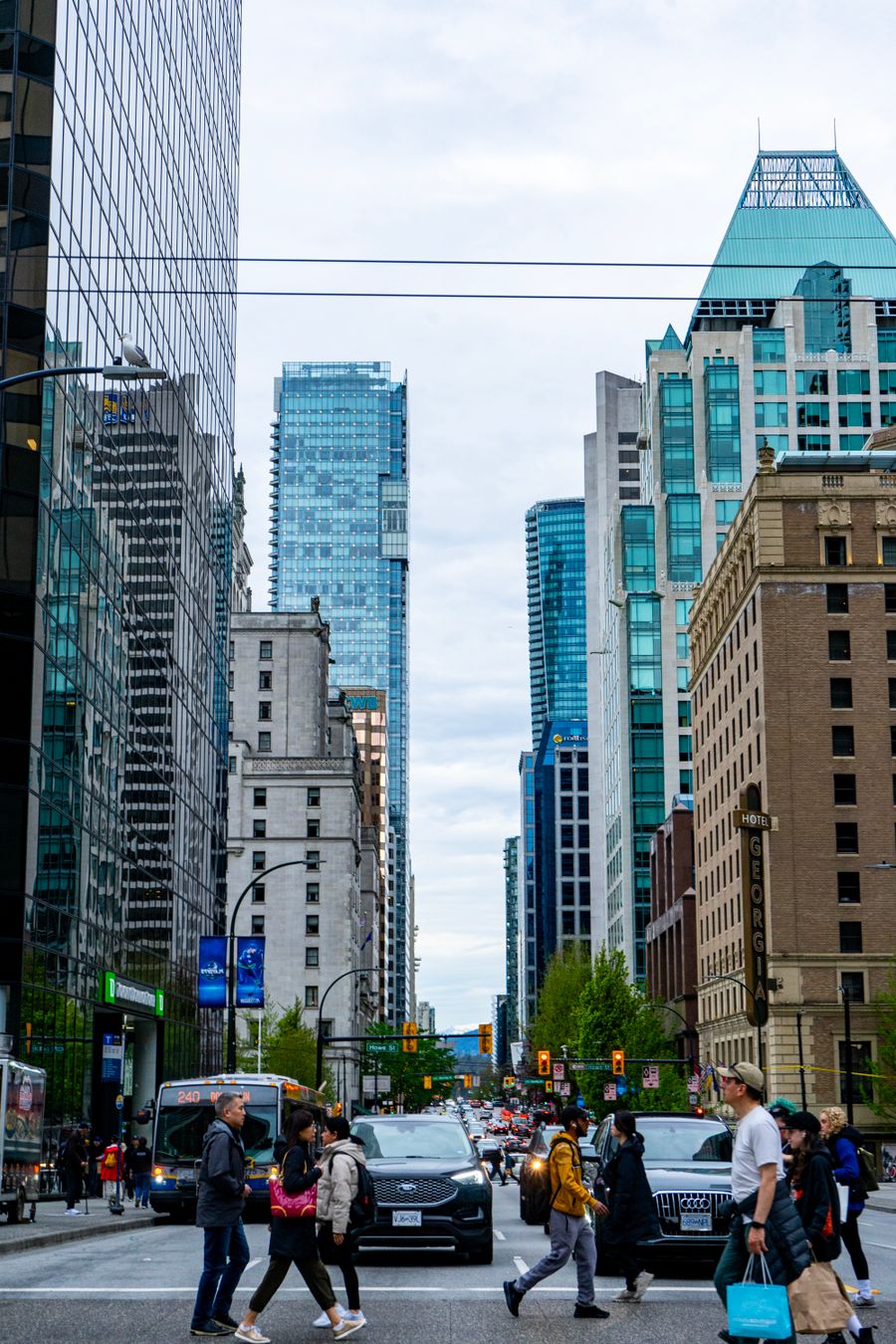 Downtown Vancouver busy street with pedestrians and skyscrapers