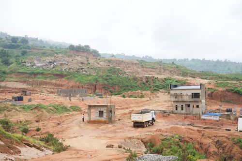 Free Expansive view of a construction site in Abuja, showcasing rugged terrain and construction activity. Stock Photo