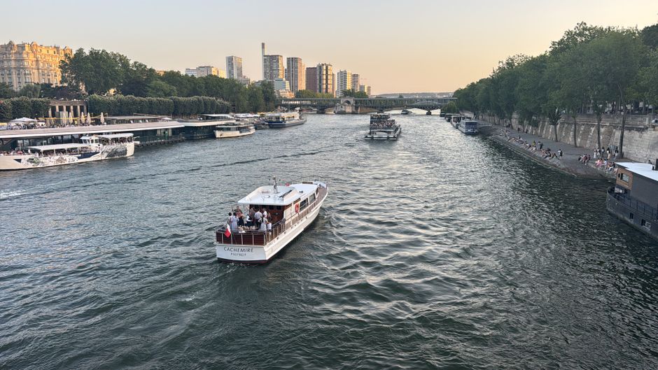 Sunset over the Seine River in Paris during summer