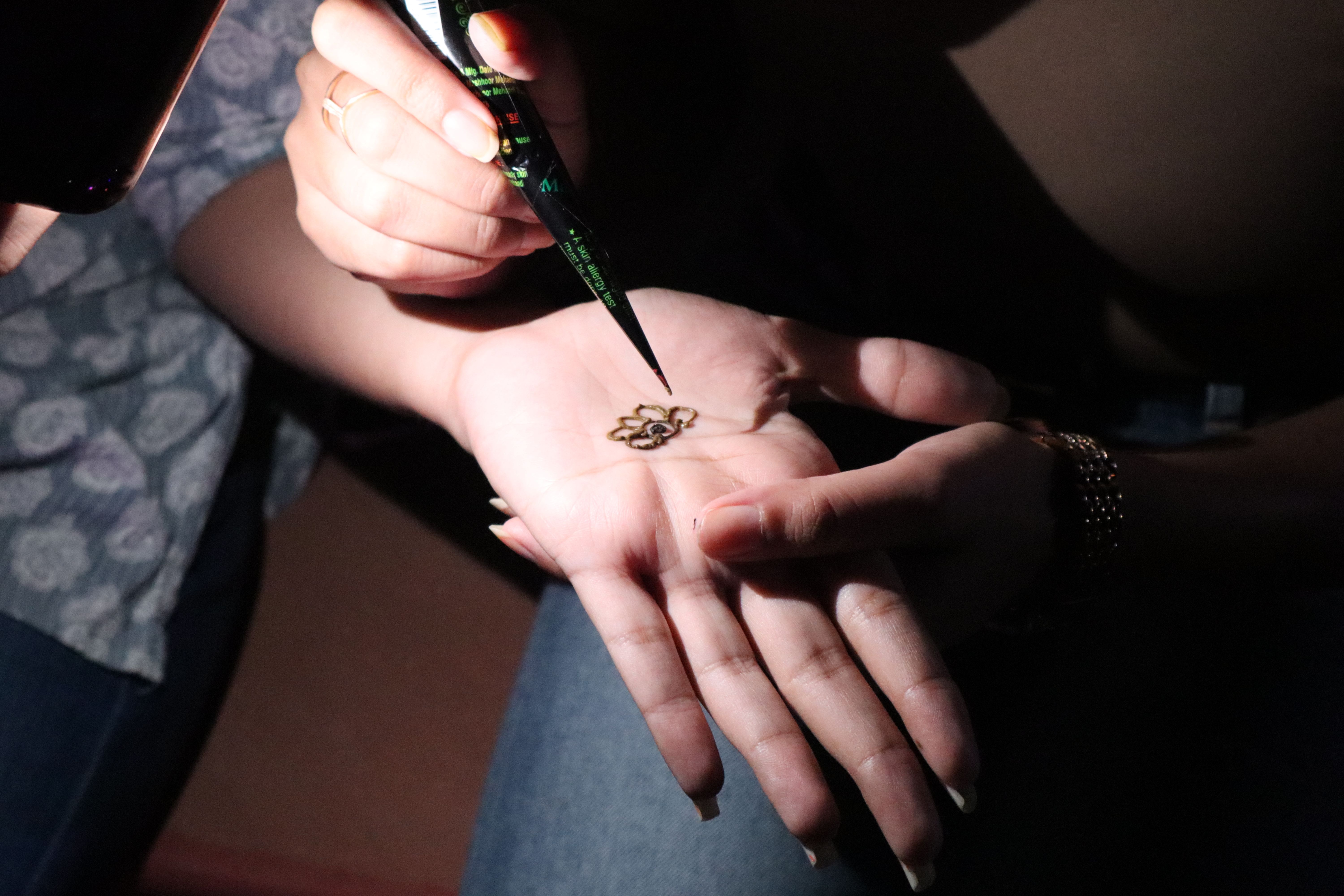 Detailed close-up view of a realistic temporary tattoo applied to wrist area