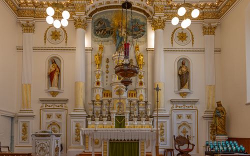 Free Intricate church altar with religious statues and artistic decor. Stock Photo