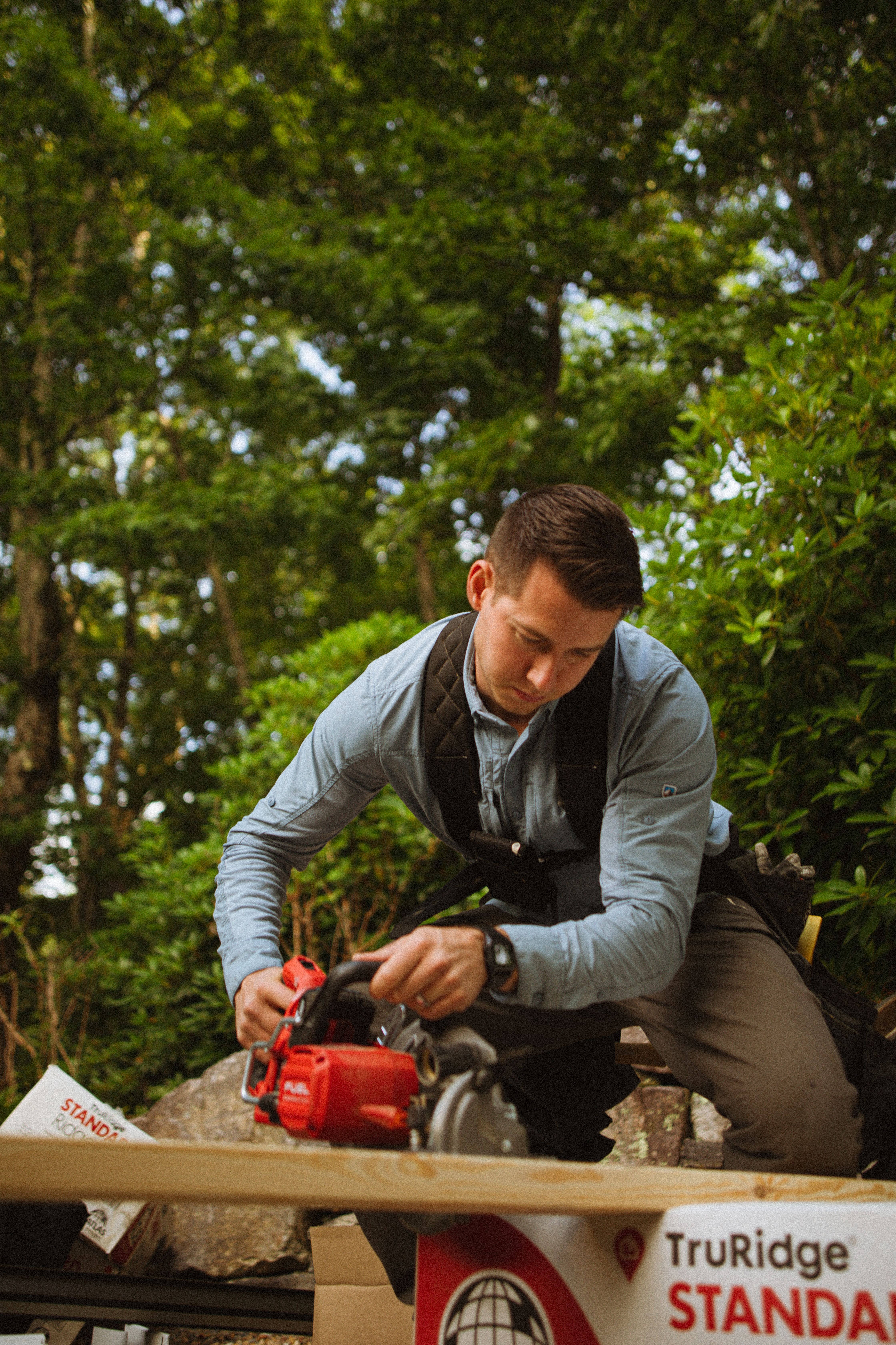 Construction worker using power tools for home improvement in Cashiers, North Carolina.