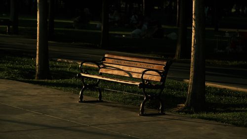 Free A peaceful park bench in the glow of sunset, located in Istanbul's urban landscape. Stock Photo