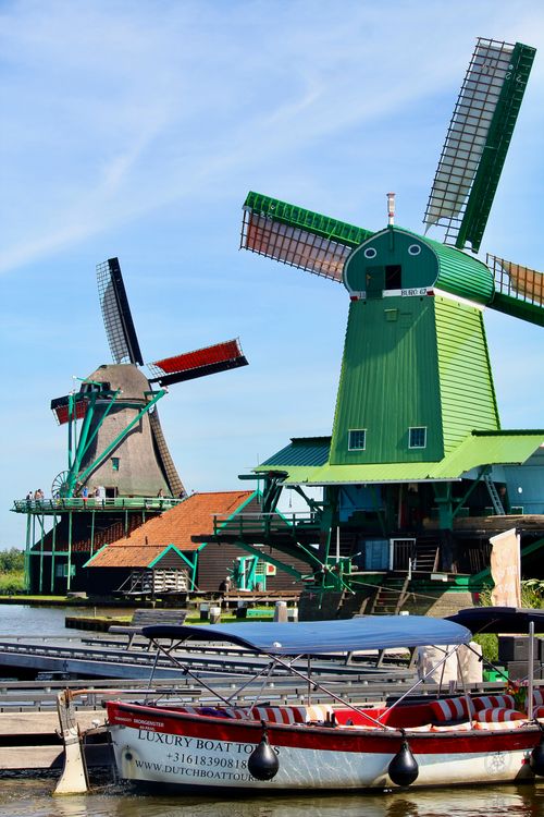 Free Picturesque windmills at Zaanse Schans in Zaandam, capturing Dutch heritage. Stock Photo