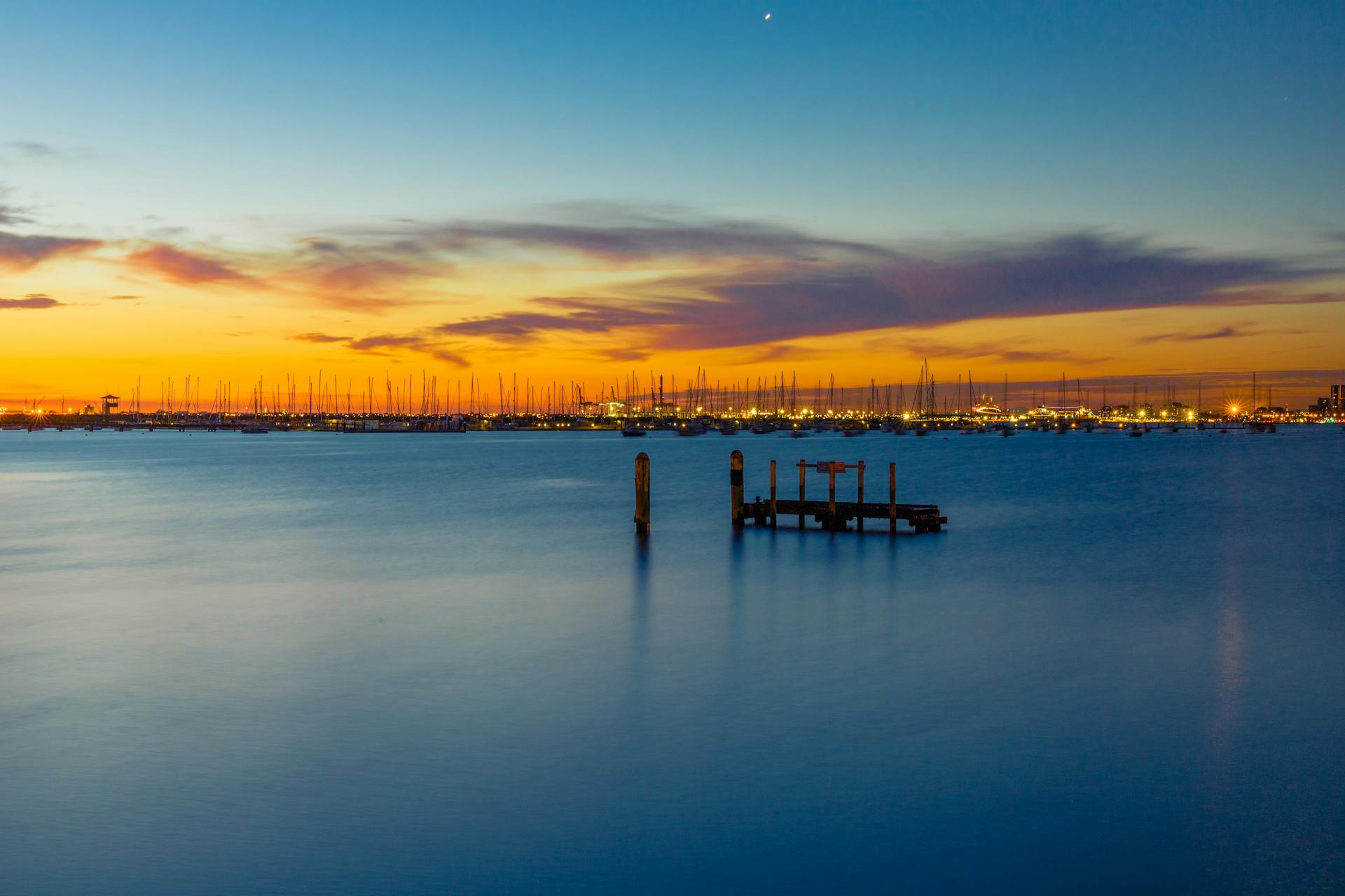 Boats on Sea During Sunset