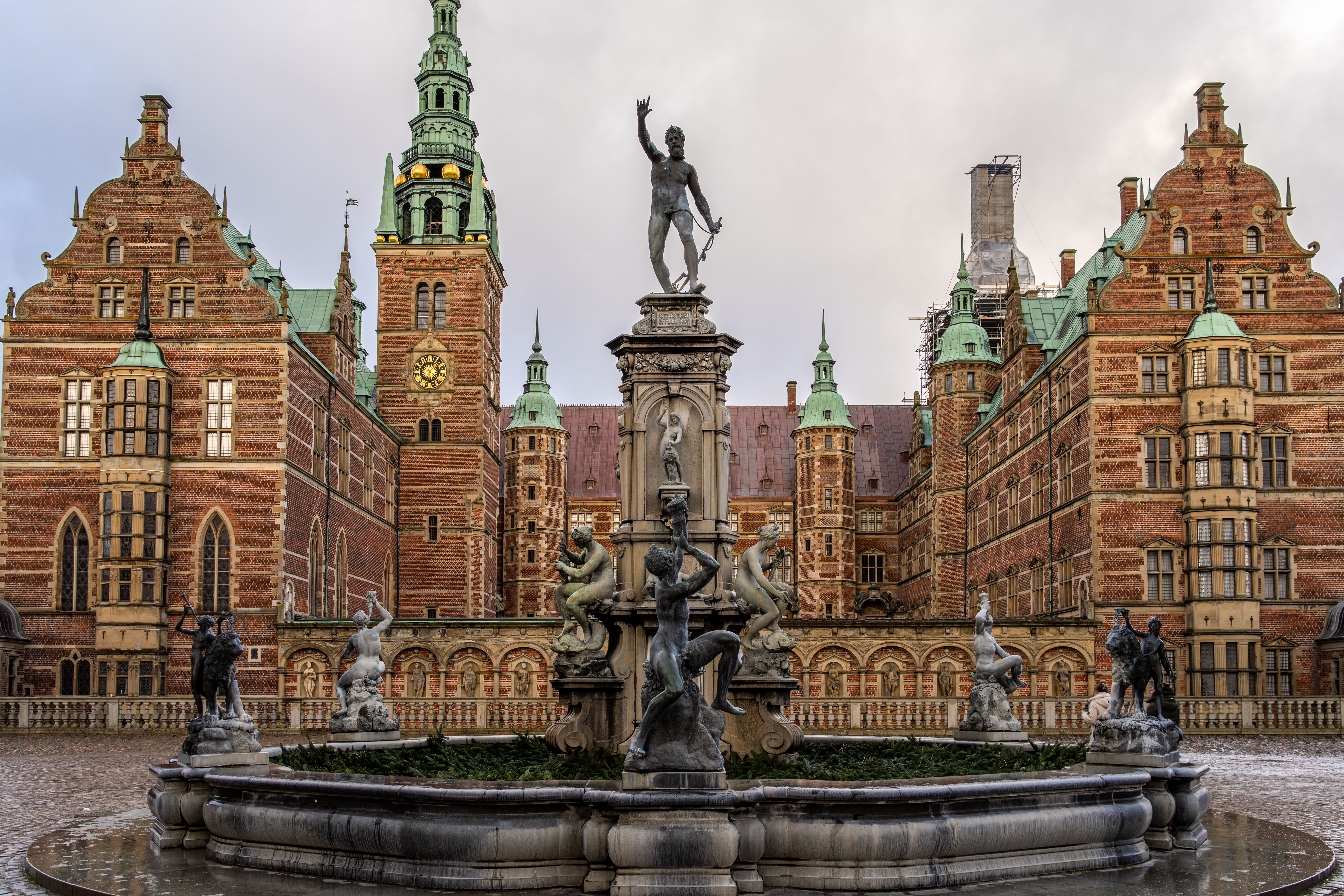 Explore the grandeur of the Neptune Fountain at Frederiksborg Castle in Hillerød, Denmark.
