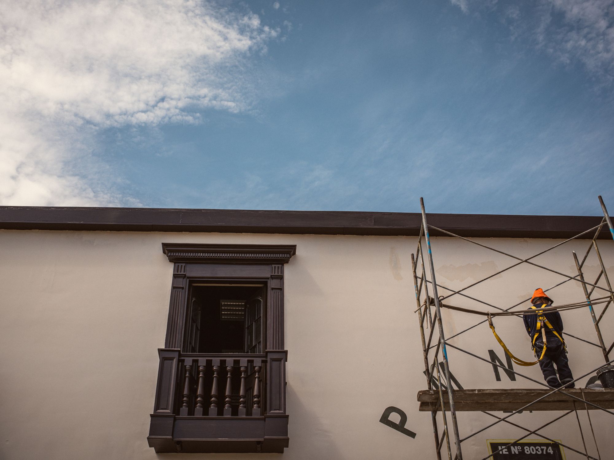 Masonry and Render Painting in Nunhead, Southwark — professional painter and decorator at work