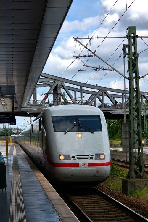Free High-speed ICE train at a Berlin station on a cloudy day Stock Photo