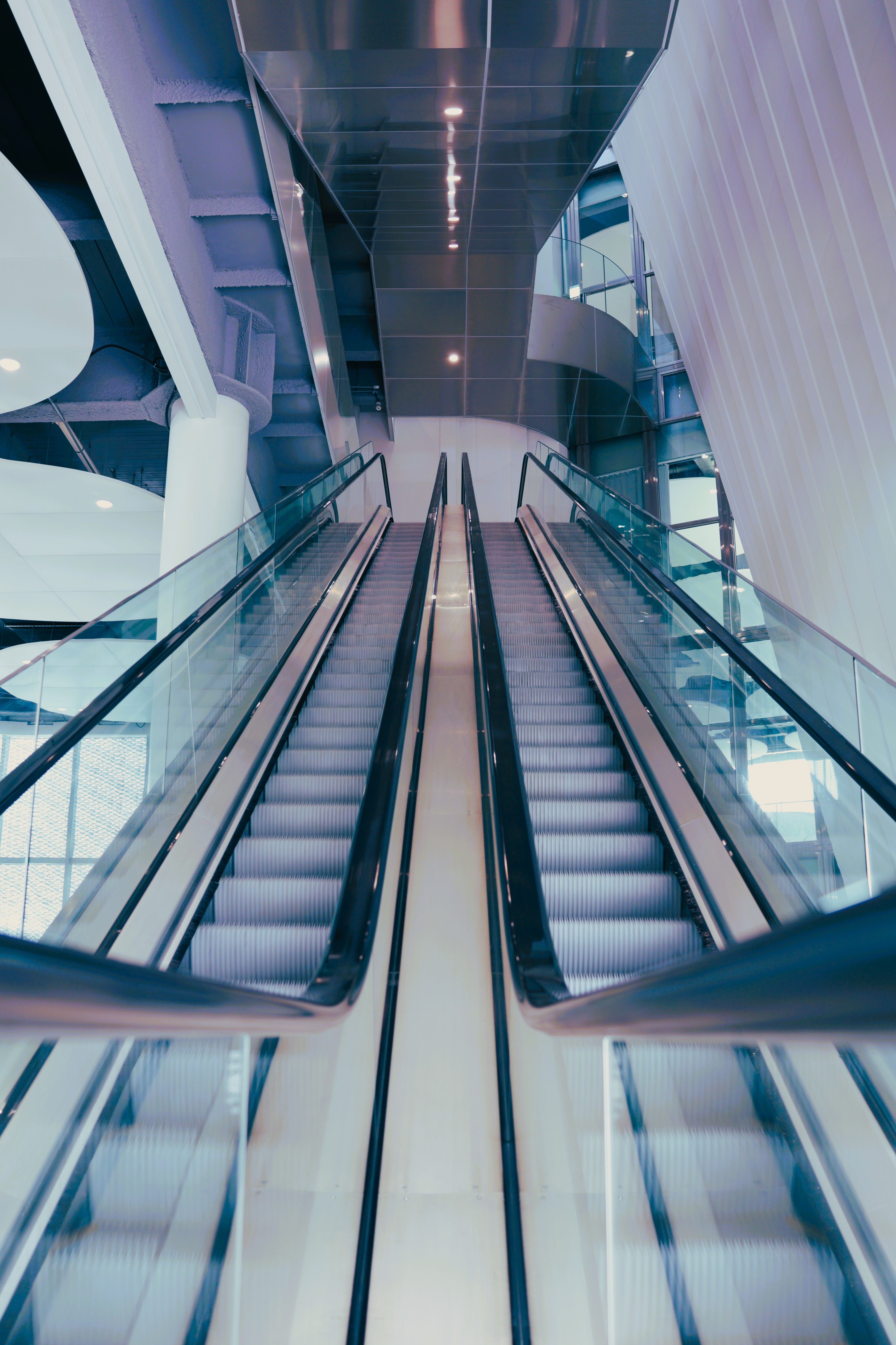 Escalators with Glass Panel Handrails · Free Stock Photo