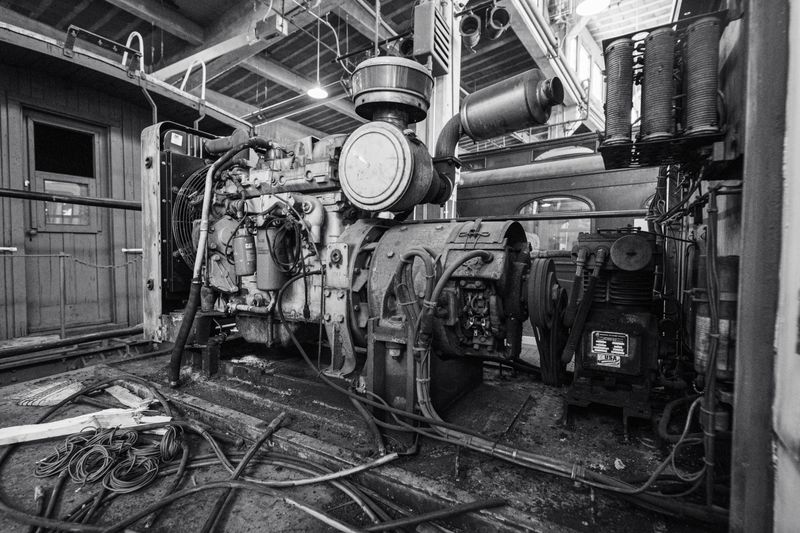 Vintage industrial engine inside a building