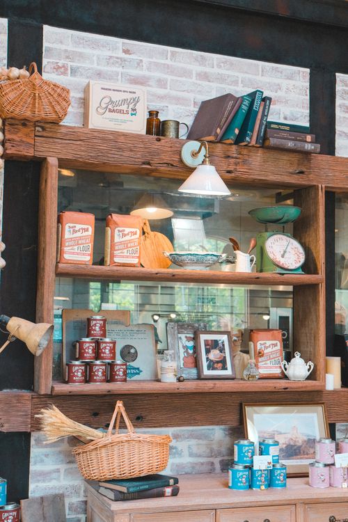 Free Rustic wooden shelf with vintage decor at a bakery in Kuala Lumpur, Malaysia. Stock Photo