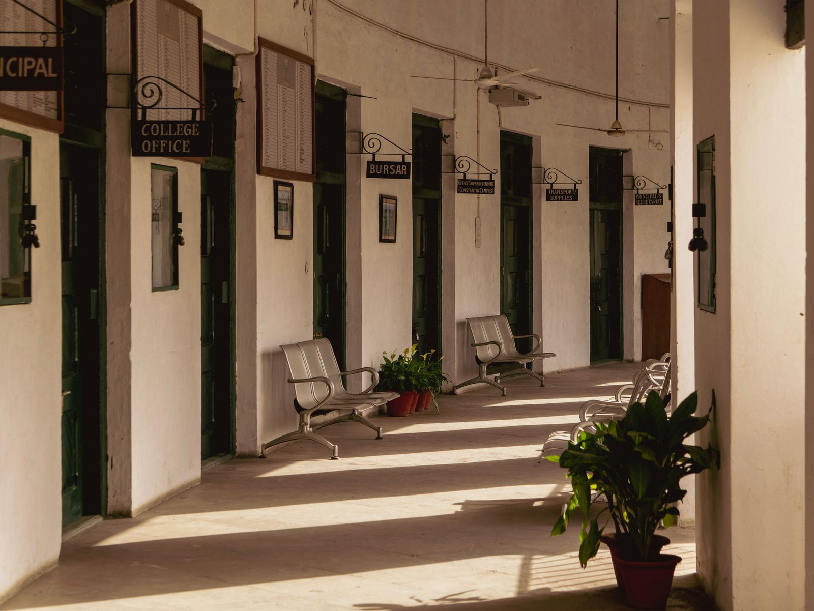 A long arched school corridor in soft morning light