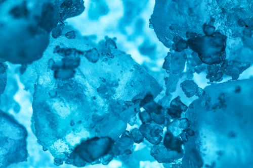 Free Detailed macro shot showcasing the intricate textures of blue crystals. Stock Photo