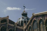 A stunning view of the decorative dome at Mercado Central in Valencia, showcasing intricate architectural details.