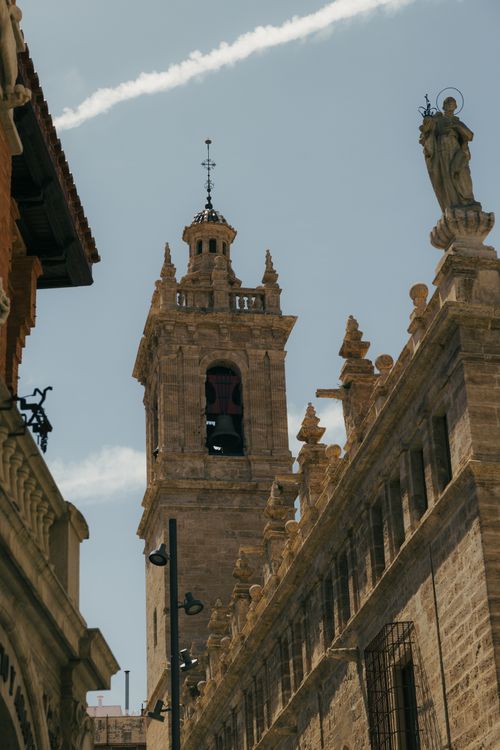 Free Historic bell tower in Valencia, Spain with intricate architectural details under a clear sky. Stock Photo