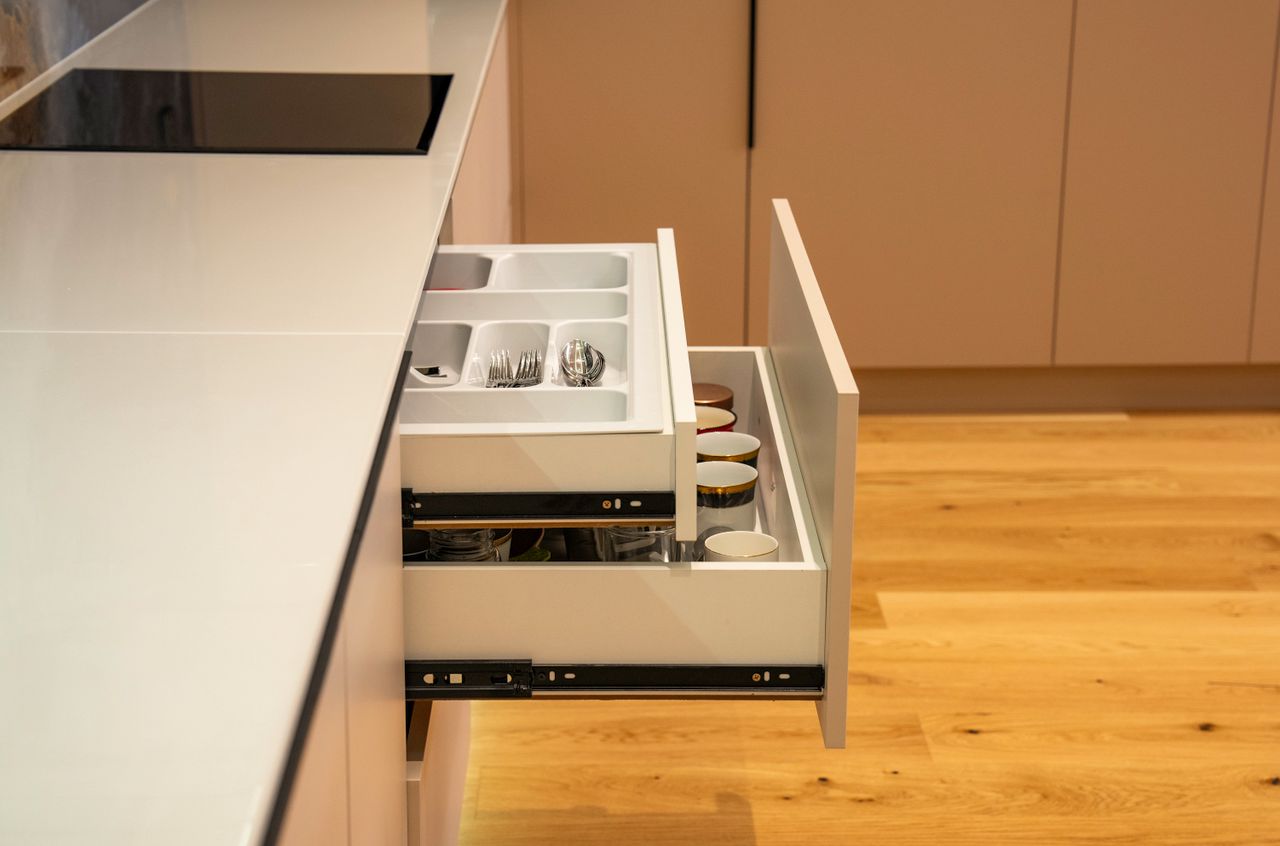 Runners fitted inside a cabinet