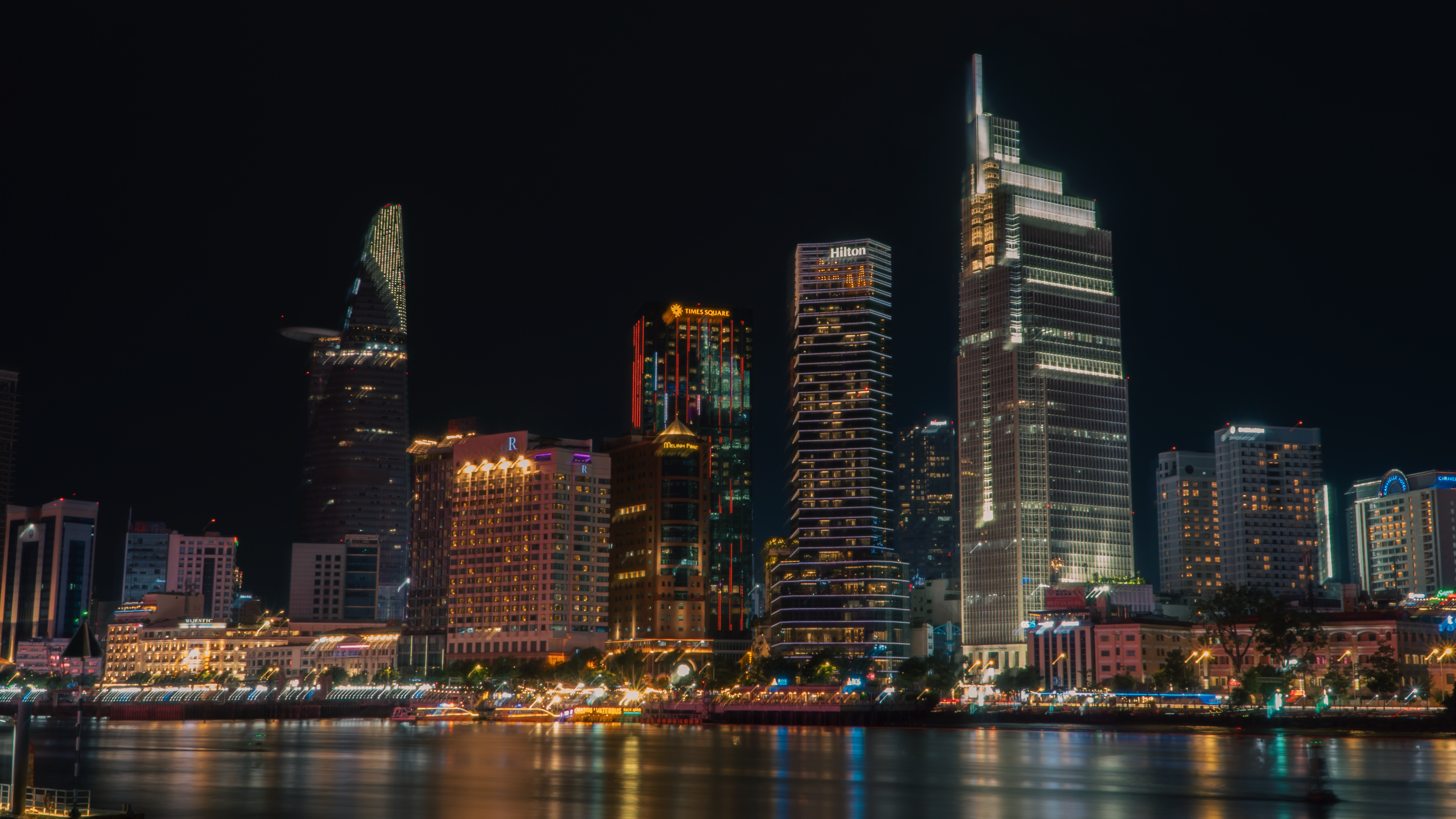 Stunning illuminated skyline of Ho Chi Minh City at night.