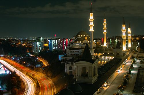 Free Captivating night view of Kocatepe Mosque with cityscape and light trails in Ankara, Türkiye. Stock Photo